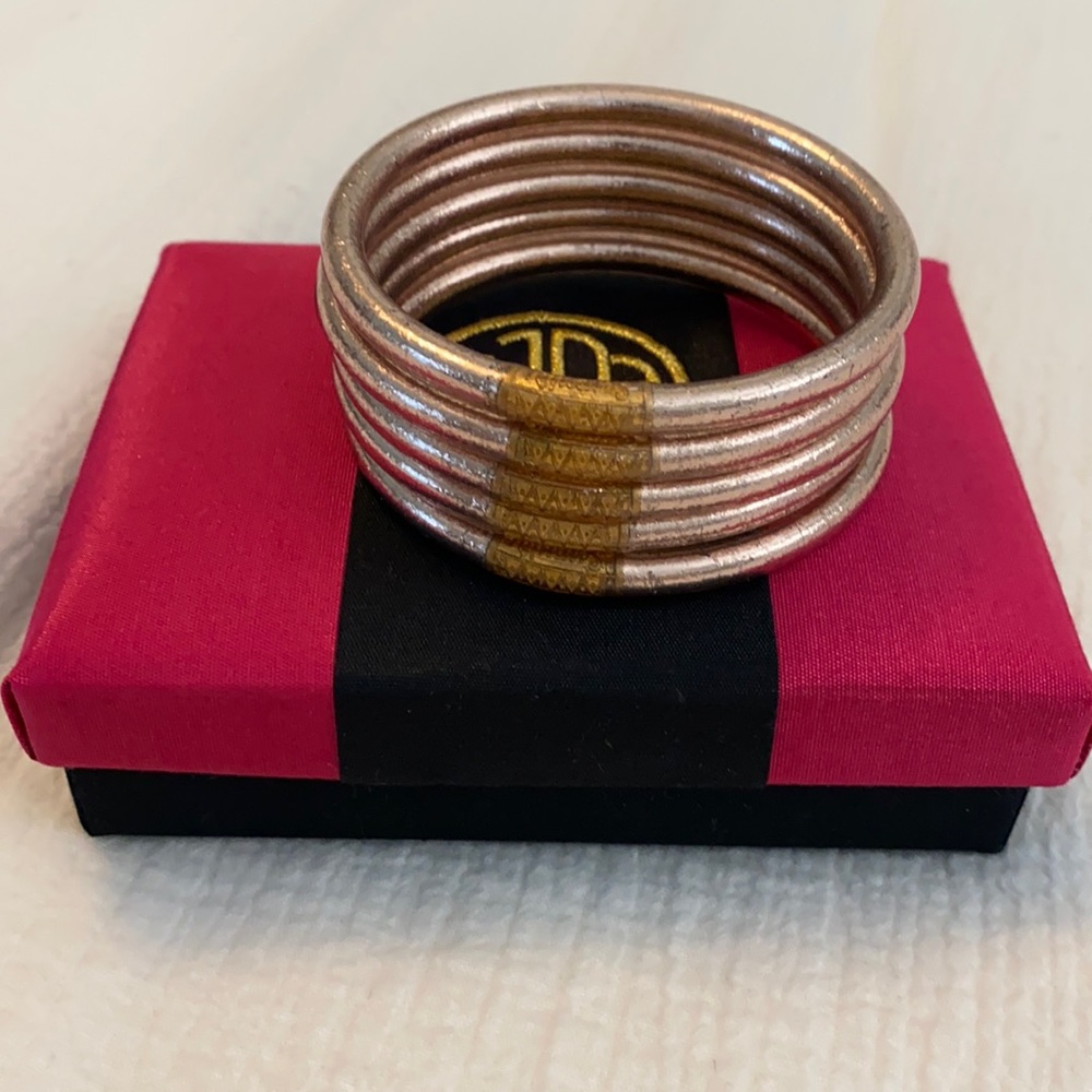 Budha girl all weather champagne bangles 5 total.